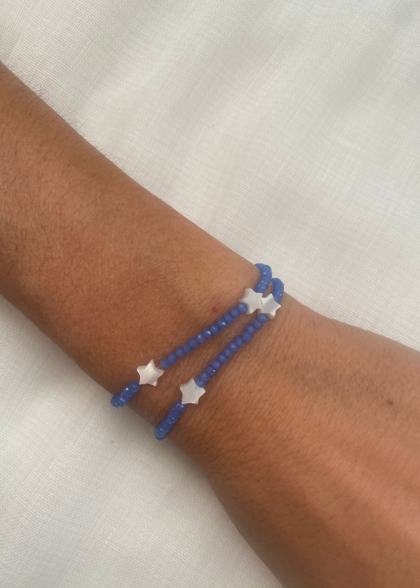 Pulsera doble estrellas nácar