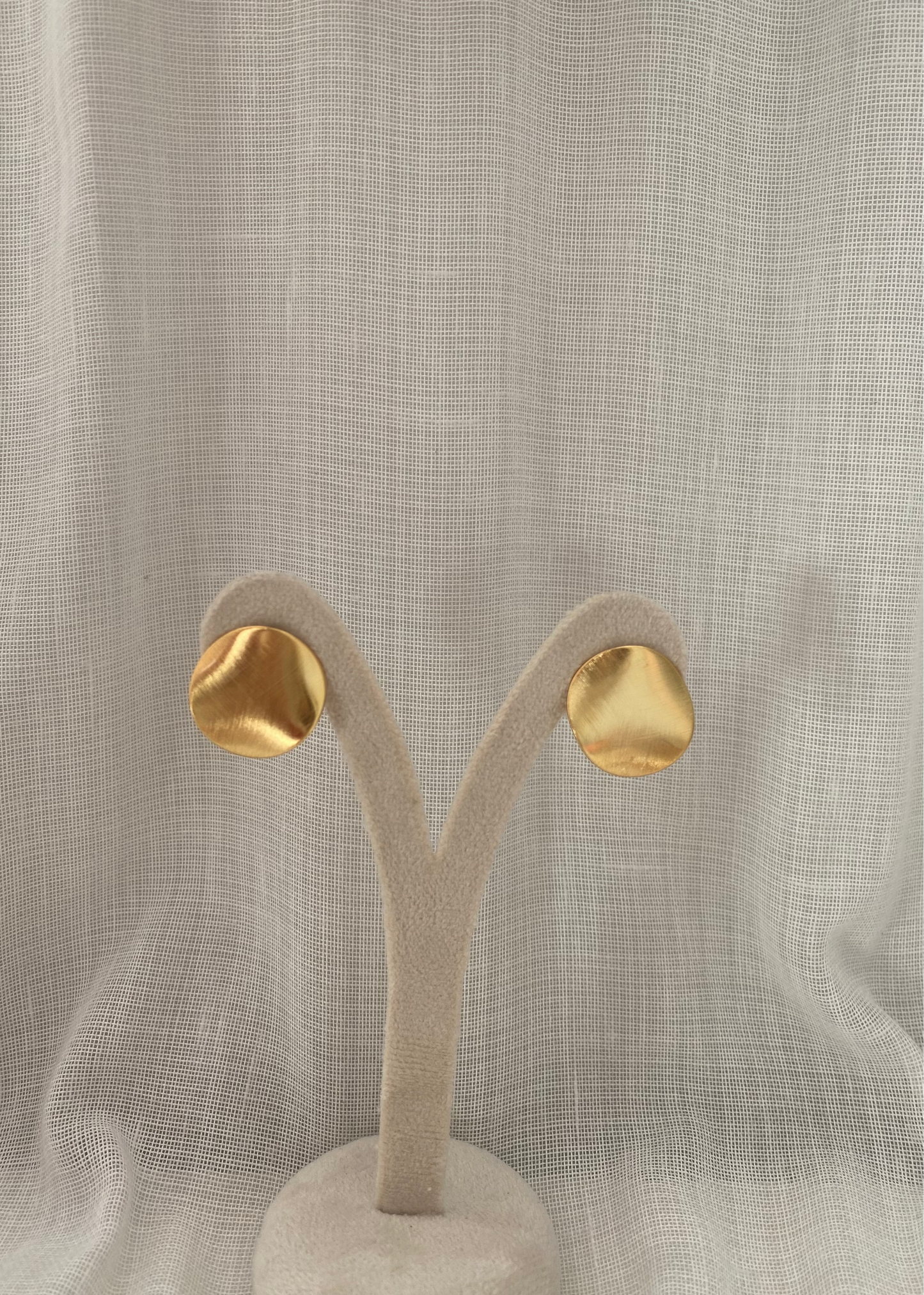 Pendientes achatados