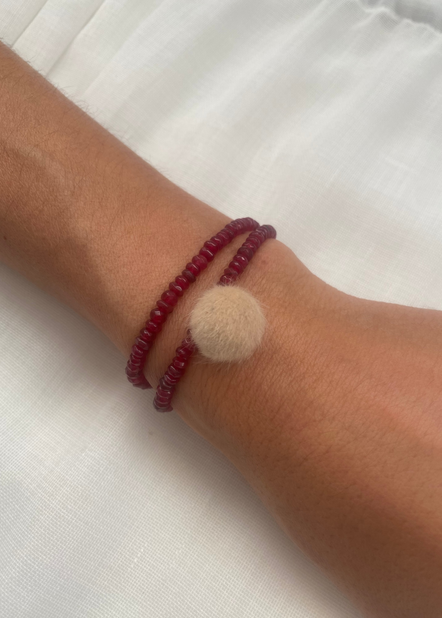 Pulsera pompón