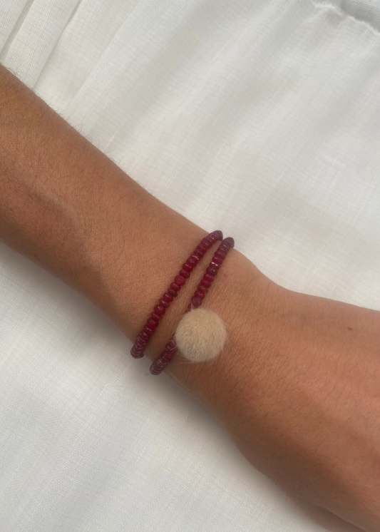 Pulsera pompón